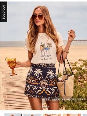 Vici Black Mini Skirt with White and Brown Tropical Motif